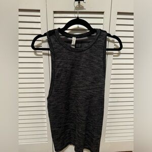 Lululemon Size 6 gray tank with built in bra. Excellent condition.